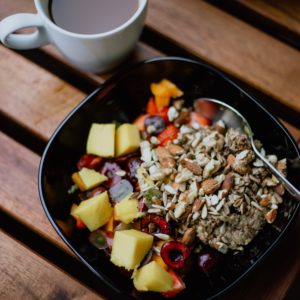 ceramic bowl beside white ceramic mug